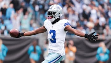 Oct 12, 2025; Charlotte, North Carolina, USA; Dallas Cowboys wide receiver George Pickens (3) celebrates a touchdown during the second half against the Carolina Panthers at Bank of America Stadium. 