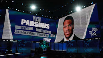 Penn State Nittany Lions wide receiver Micah Parsons is displayed on the video board after being selected as the 12th  pick by the Dallas Cowboys during the 2021 NFL Draft  at First Energy Stadium.