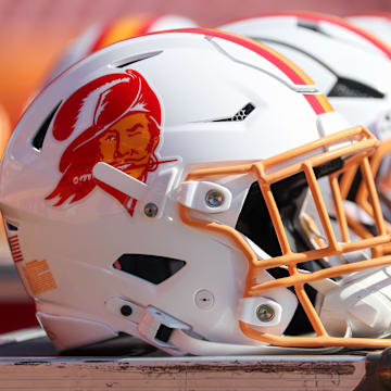Sep 21, 2025; Tampa, Florida, USA; Tampa Bay Buccaneers helmets sit on the sideline before a game against the New York Jets at Raymond James Stadium. Mandatory Credit: Nathan Ray Seebeck-Imagn Images