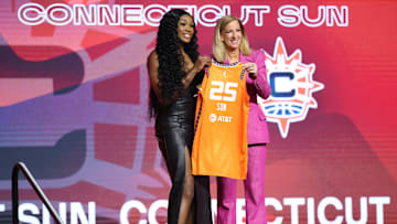 Apr 14, 2025; New York, New York, USA; Aneesah Morrow poses with WNBA commissioner Cathy Engelbert after being selected with the number seven overall pick to the Connecticut Sun in the 2025 WNBA Draft at The Shed at Hudson Yards.