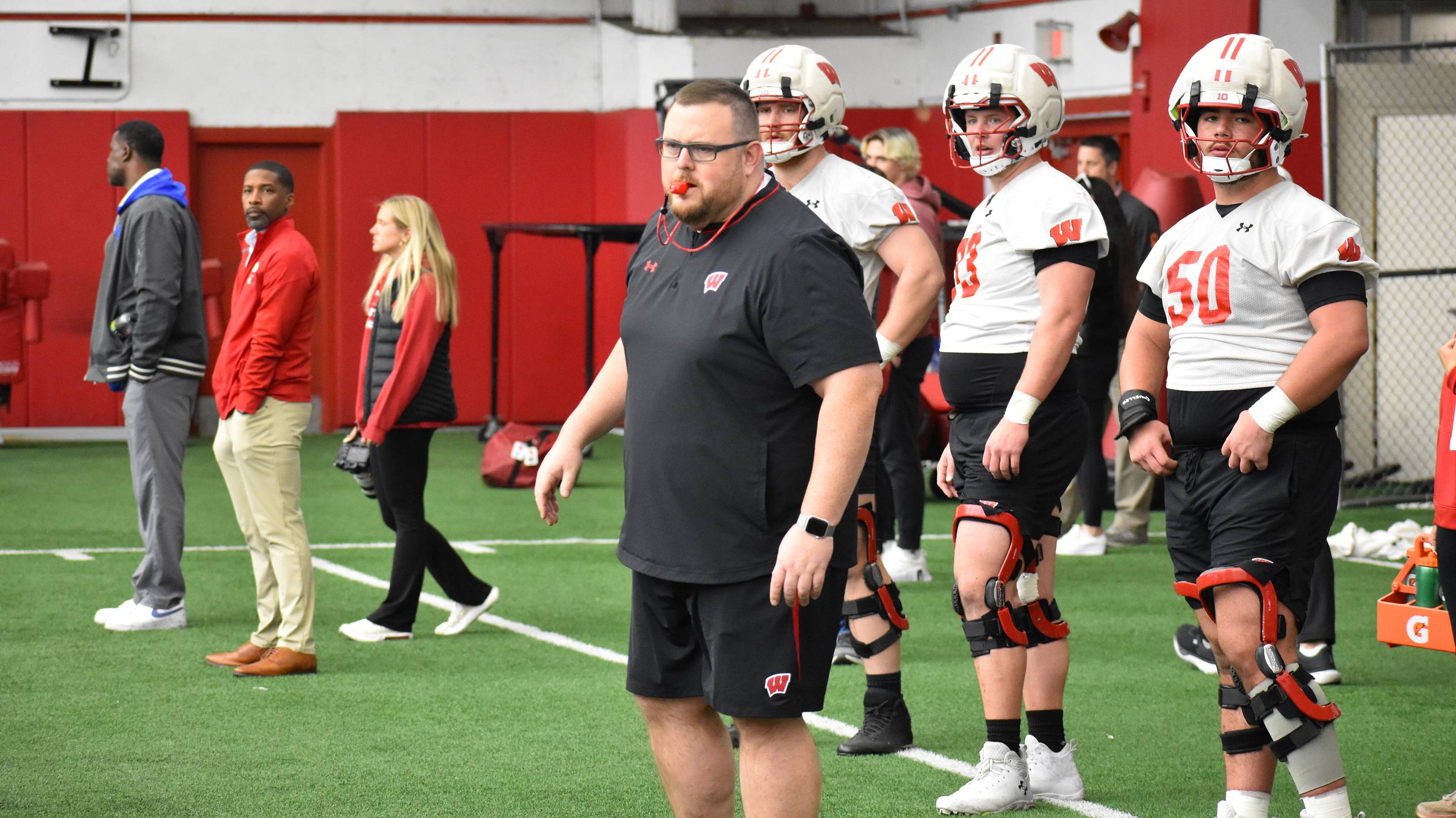 Wisconsin OL Coach Eric Mateos Names the Player Who's Impressed Him This Summer