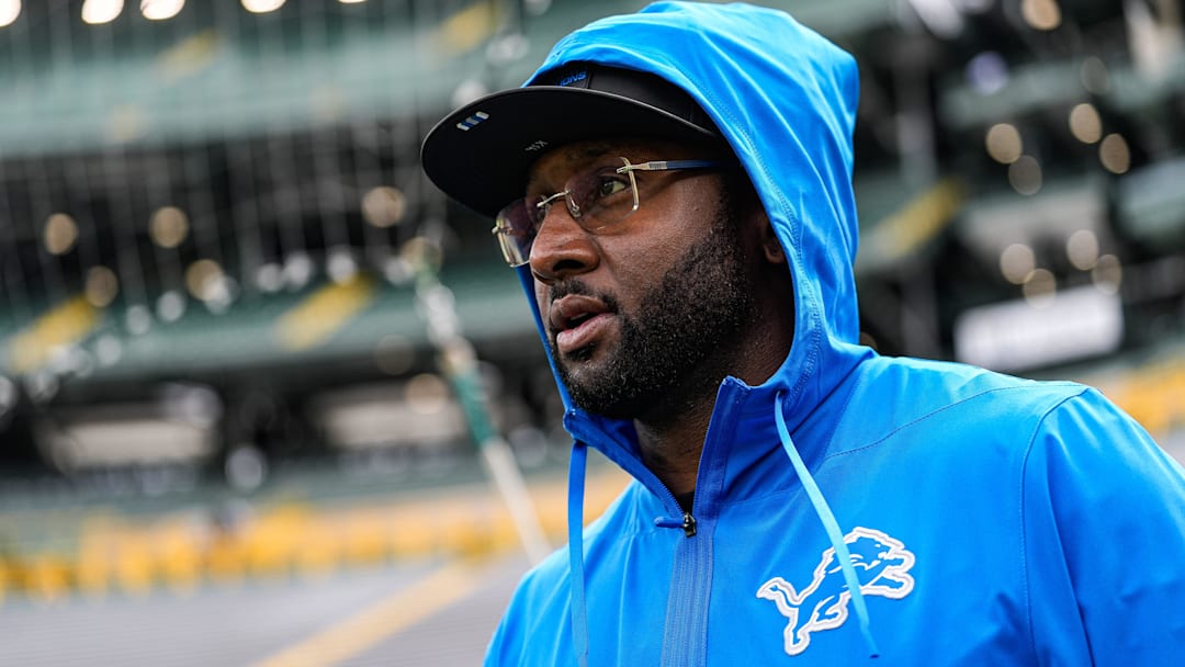 Detroit Lions defensive coordinator Kelvin Sheppard walks onto the field for warm-up ahead of the Green Bay Packers game at Lambeau Field in Green Bay, Wis., on Sunday, September 7, 2025.