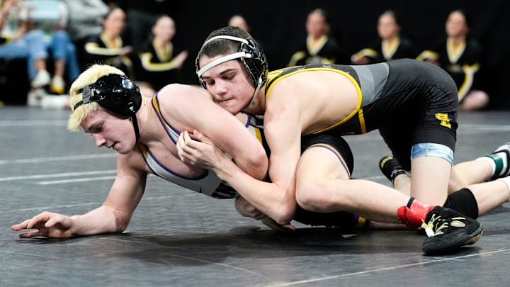 Southeast Polk’s Nico Desalvo wrestles Indianola’s Ayden Swedberg in a Class 3A 113-pound match at the IHSAA State Dual Tournament Saturday, Feb. 8, 2025 at Xtream Arena in Coralville, Iowa.