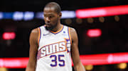 Jan 28, 2024; Orlando, Florida, USA;  Phoenix Suns forward Kevin Durant (35) looks on during a break in play against the Orlando Magic in the first quarter at the Kia Center. Mandatory Credit: Nathan Ray Seebeck-Imagn Images