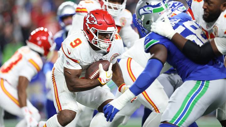 Kansas City Chiefs running back Kenneth Walker with the ball against the Seattle Seahawks.
