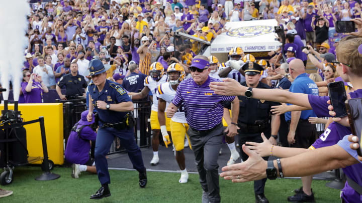 Sep 17, 2022; Baton Rouge, Louisiana, USA;  LSU Tigers head coach Brian Kelly leads the team to the field  against the Mississippi State Bulldogs during the first half at Tiger Stadium. Mandatory Credit: Stephen Lew-USA TODAY Sports