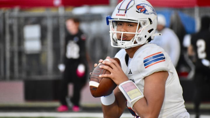 Ninth grader A.J. Tuivaiave passed for a career-high 435 yards and seven touchdown in Graham-Kapowsin's win over Yelm.