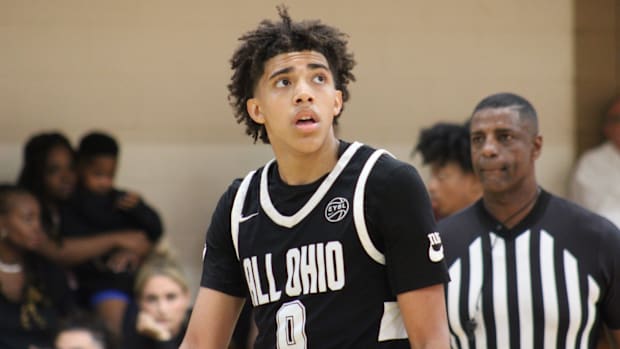 Mark Pope went on a peculiar recruiting visit to see five star PG Tay