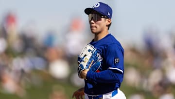 Feb 20, 2025; Phoenix, Arizona, USA; Los Angeles Dodgers second baseman Hyeseong Kim against the Chicago Cubs during a spring training game at Camelback Ranch-Glendale. Mandatory Credit: Mark J. Rebilas-Imagn Images