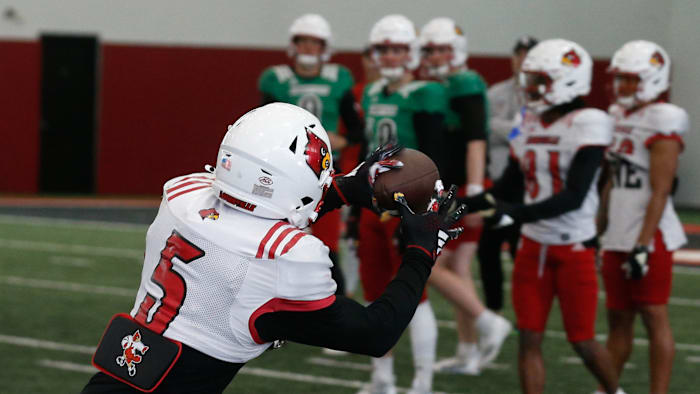Louisville’s Caullin Lacy (5) catches the ball during Spring Practice on Thursday, April 4, 2024