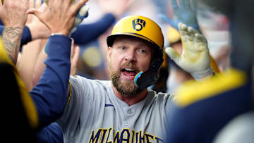 May 31, 2025; Philadelphia, Pennsylvania, USA; Milwaukee Brewers infielder Rhys Hoskins (12) celebrates with teammates after hitting a three-run home run against the Philadelphia Phillies in the first inning at Citizens Bank Park. Mandatory Credit: Kyle Ross-Imagn Images