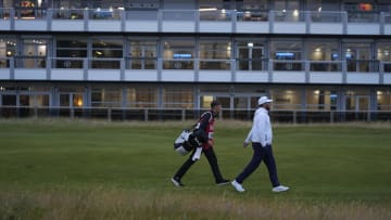 Daniel Brown finished in near-darkness Thursday at Royal Troon, and in the lead.