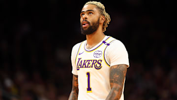 Nov 26, 2024; Phoenix, Arizona, USA; Los Angeles Lakers guard D'Angelo Russell (1) against the Phoenix Suns during an NBA Cup game at Footprint Center. Mandatory Credit: Mark J. Rebilas-Imagn Images