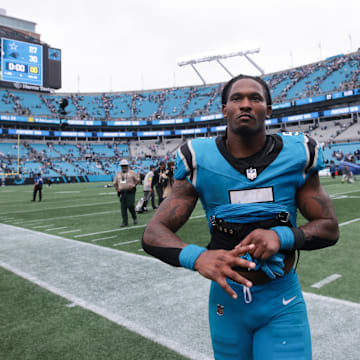 Oct 12, 2025; Charlotte, North Carolina, USA; Carolina Panthers running back Rico Dowdle (5) looks on after the game against the Dallas Cowboys  at Bank of America Stadium. Mandatory Credit: Scott Kinser-Imagn Images