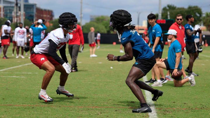 Jacksonville Jaguars wide receiver Brian Thomas Jr. (7) works on technique with Tampa Bay Buccaneers cornerback Zyon McCollum (27) during a combined NFL football training camp session between the Tampa Bay Buccaneers and Jacksonville Jaguars Thursday, Aug. 15, 2024 at EverBank StadiumÕs Miller Electric Center in Jacksonville, Fla. [Corey Perrine/Florida Times-Union]