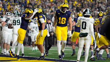Michigan tight end Colston Loveland (18) celebrates scoring a touchdown against Michigan State during the second half at Michigan Stadium in Ann Arbor on Saturday, Oct. 26, 2024.