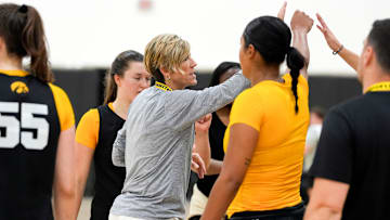 Iowa head coach Jan Jensen huddles with her team during a women’s basketball practice July 22, 2025 at Carver-Hawkeye Arena in Iowa City, Iowa.