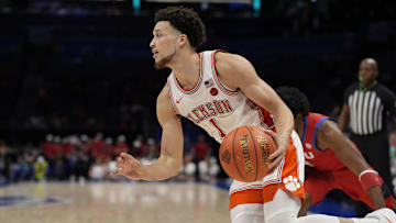 Mar 13, 2025; Charlotte, NC, USA;  Clemson Tigers guard Chase Hunter (1) drives to the basket against the Southern Methodist Mustangs during the second half at Spectrum Center. Mandatory Credit: Jim Dedmon-Imagn Images
