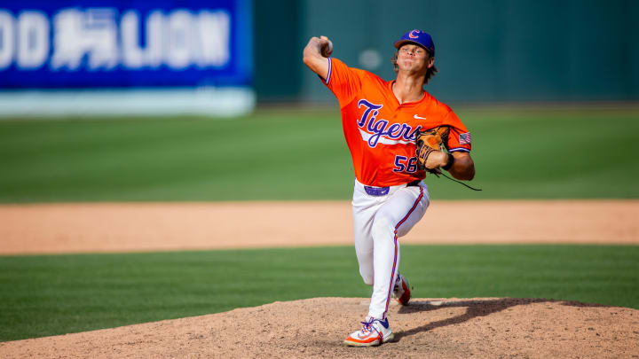 May 24, 2024; Charlotte, NC, USA; Clemson Tigers pitcher Austin Gordon (56) starts the eighth inning against the Louisville Cardinals during the ACC Baseball Tournament at Truist Field. 