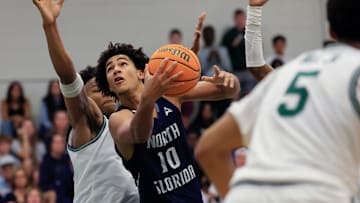 North Florida Ospreys forward Josh Harris (10) drives to the basket during the second half of an NCAA men’s basketball matchup Saturday, Feb. 1, 2025 at Jacksonville University in Jacksonville, Fla. UNF held off a late rally from JU defeating them 81-78. [Corey Perrine/Florida Times-Union]
