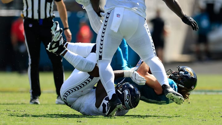 Jacksonville Jaguars quarterback Trevor Lawrence (16) is sacked by Seattle Seahawks linebacker DeMarcus Lawrence a during the second quarter of an NFL football matchup, Sunday, Oct. 12, 2025, at EverBank Stadium in Jacksonville, Fla. [Corey Perrine/Florida Times-Union]