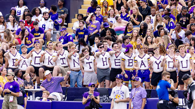 LSU Tigers student section fans paint their chest Back In the Bayou during pregame before the game against the Nicholls State