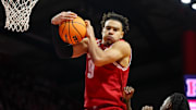 Jan 6, 2025; Piscataway, New Jersey, USA; Wisconsin Badgers guard John Tonje (9) rebounds during the second half against the Rutgers Scarlet Knights at Jersey Mike's Arena. Mandatory Credit: Vincent Carchietta-Imagn Images