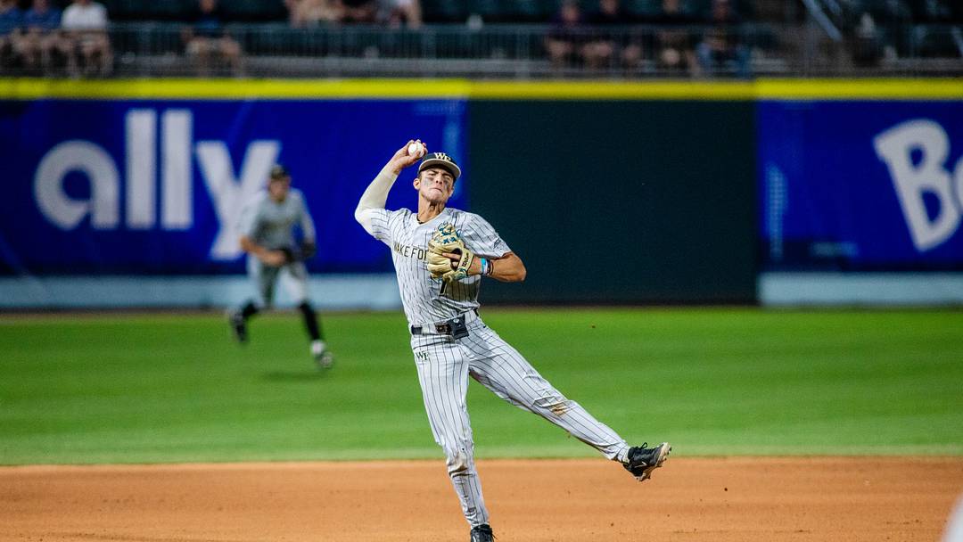 May 24, 2024; Charlotte, NC, USA; Wake Forest infielder Marek Houston (7) throws home for an out against the North Carolina Tar Heels in the eleventh inning during the ACC Baseball Tournament at Truist Field. 