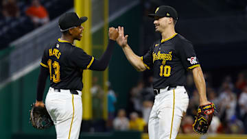 Pittsburgh Pirates stars Bryan Reynolds and Ke'Bryan Hayes celebrate a victory.