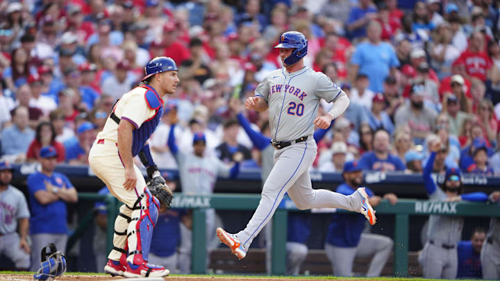 Sep 14, 2024; Philadelphia, Pennsylvania, USA; New York Mets first baseman Pete Alonso (20) scores a run on a RBI triple by right fielder Starling Marte (not pictured) against the Philadelphia Phillies during the third inning at Citizens Bank Park.