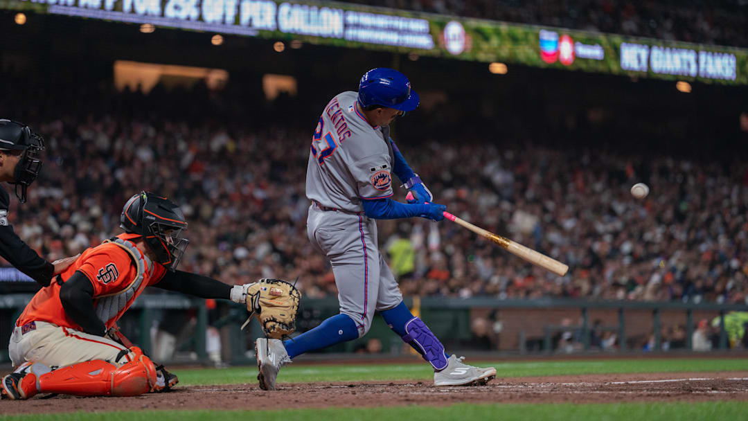 Apr 3, 2026; San Francisco, California, USA; New York Mets designated hitter Mark Vientos (27) hits an RBI single against the San Francisco Giants during the seventh inning at Oracle Park. Mandatory Credit: Neville E. Guard-Imagn Images