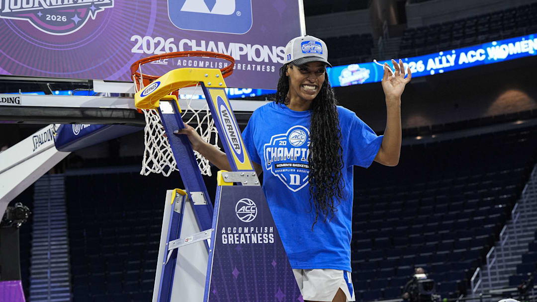 Duke Blue Devils guard Ashlon Jackson cuts down the net after Duke defeated the Louisville Cardinals at Gas South Arena. Mandatory Credit: Dale Zanine-Imagn Images