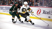 Apr 26, 2025; Saint Paul, Minnesota, USA; Minnesota Wild defenseman Brock Faber (7) chases Vegas Golden Knights left wing Pavel Dorofeyev (16) during the first period in game four of the first round of the 2025 Stanley Cup Playoffs at Xcel Energy Center. Mandatory Credit: Bruce Fedyck-Imagn Images