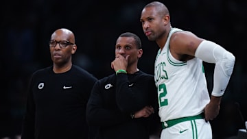 Boston Celtics head coach Joe Mazzulla talks with center Al Horford (42) from the sideline as they take on the New York Knicks during game one of the second round for the 2025 NBA Playoffs at TD Garden.