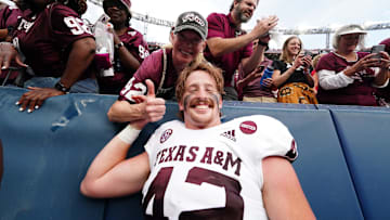 Sep 11, 2021; Denver, Colorado, USA; Texas A&M Aggies tight end Max Wright (42) celebrates defeating the Colorado Buffaloes at Empower Field at Mile High. Mandatory Credit: Ron Chenoy-Imagn Images