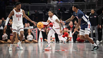 Mar 14, 2025; Kansas City, MO, USA; Texas Tech Red Raiders guard Elijah Hawkins (3) brings the ball up court during the first half against the Arizona Wildcats at T-Mobile Center. Mandatory Credit: William Purnell-Imagn Images