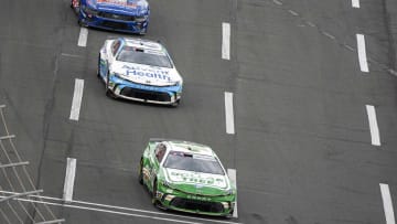 May 26, 2024; Concord, North Carolina, USA; NASCAR Cup Series driver Erik Jones (43), driver Jimmie Johnson (84) and driver Michael McDowell (34) at Charlotte Motor Speedway. Mandatory Credit: Jim Dedmon-USA TODAY Sports