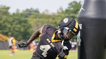 Aug 6, 2025; Columbia, MO, USA; Missouri Tigers wide receiver James Madison II (4) ducks around a tackle dummy at a Missouri fall camp practice at Mizzou Athletic Training Camp.