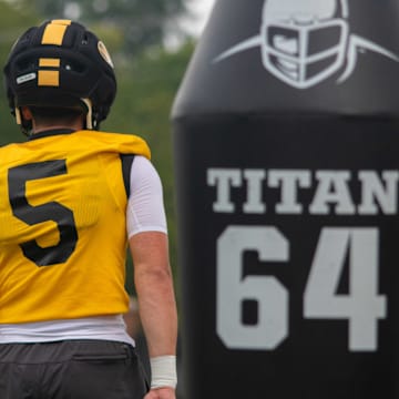 Aug 6, 2025; Columbia, MO, USA; Missouri Tigers freshman quarterback Matt Zollers (5) walks back for a drill during Missouri fall camp at Mizzou Athletic Training Complex.