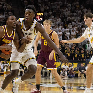 Nov 12, 2025; Columbia, Missouri, USA; Missouri Tigers forward Mark Mitchell defends a Minnesota player.