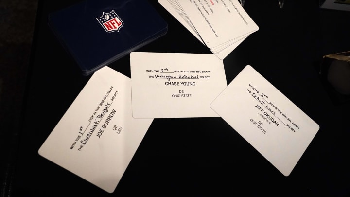 Apr 28, 2021; Canton, Ohio, USA; The draft cards of the top three picks in the 2020 NFL Draft of the