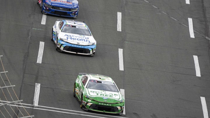 May 26, 2024; Concord, North Carolina, USA; NASCAR Cup Series driver Erik Jones (43), driver Jimmie Johnson (84) and driver Michael McDowell (34) at Charlotte Motor Speedway. Mandatory Credit: Jim Dedmon-USA TODAY Sports