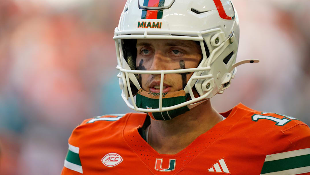 Nov 8, 2025; Miami Gardens, Florida, USA; Miami Hurricanes quarterback Carson Beck (11) looks to the bench in a game against the Syracuse Orange.