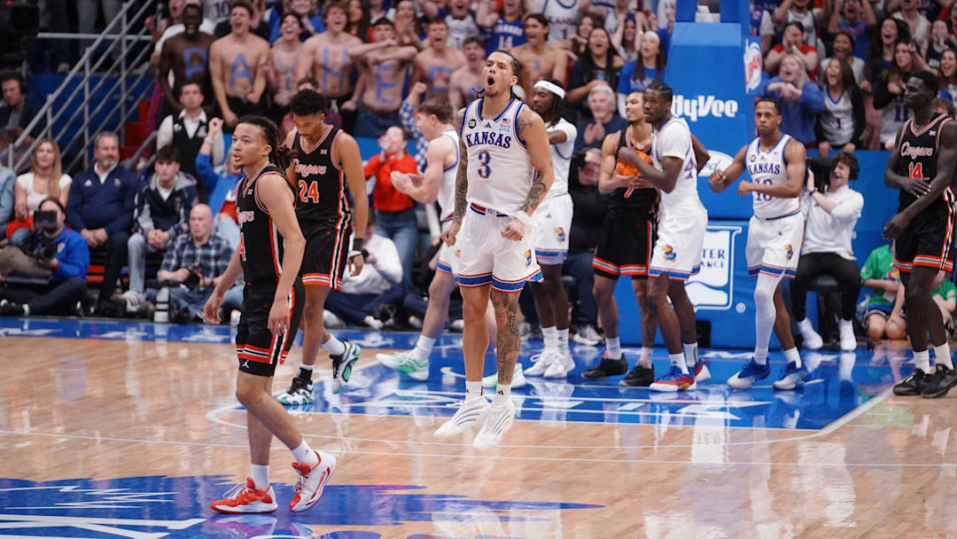 Kansas Jayhawks guard Tre White (3) yells out after a play against Houston Cougars during the game inside Allen Fieldhouse on Monday, Feb. 23, 2026.