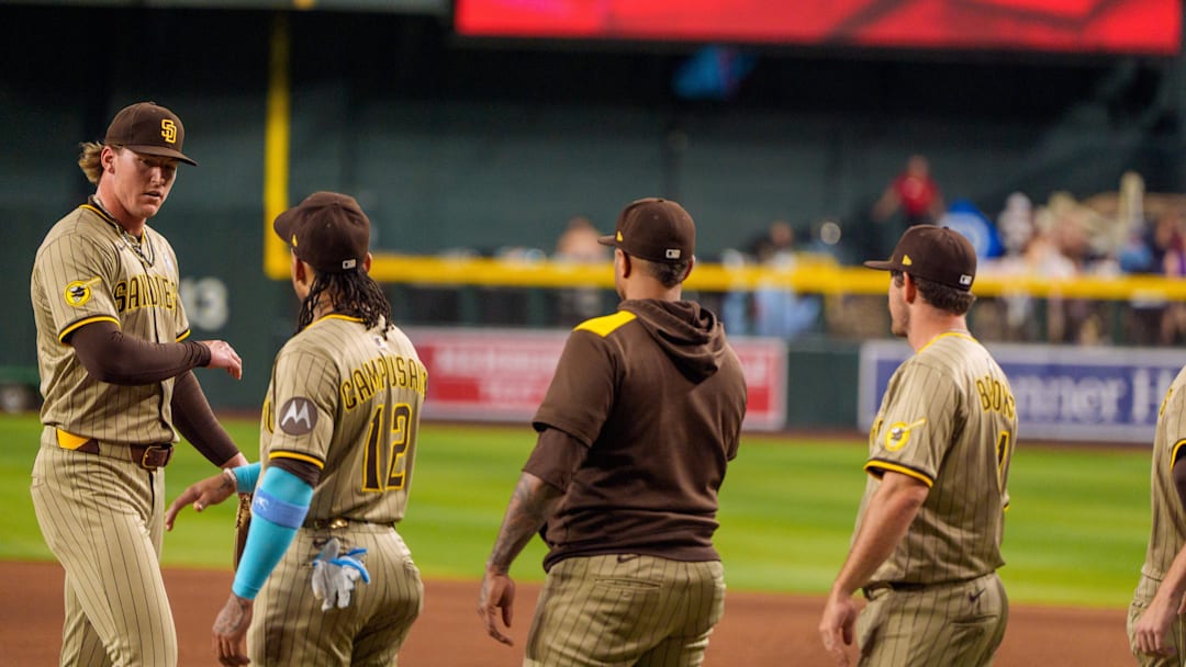 San Diego Padres pitcher Sean Reynolds (25) celebrates with his team after a victory against the Arizona Diamondbacks. at Chase Field on June 15.
