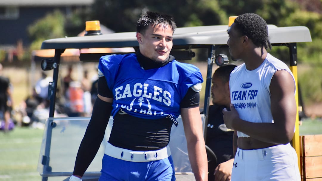 Graham-Kapowsin's Noah Flores, left, and Bethel's Zaydrius Rainey Sale participate in PLU football 11v11 Showcase in Parkland. 