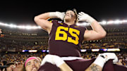 Oct 17, 2025; Minneapolis, Minnesota, USA; Minnesota Golden Gophers offensive lineman Greg Johnson (65) celebrates after the teams win against the Nebraska Cornhuskers at Huntington Bank Stadium. Mandatory Credit: Matt Krohn-Imagn Images