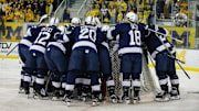 The Penn State men's hockey team huddles prior to a Big Ten Tournament game against the Michigan Wolverines.