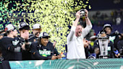 Dec 7, 2024; Indianapolis, IN, USA; Oregon Ducks head coach Dan Lanning and the Oregon Ducks celebrate defeating the Penn State Nittany Lions to win the Big Ten Championship in the 2024 Big Ten Championship game at Lucas Oil Stadium. Mandatory Credit: Jordan Prather-Imagn Images