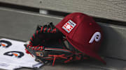 Jul 25, 2025; Bronx, New York, USA; A detailed view of a Hall of Fame patch on a Philadelphia Phillies hat resting in the dugout during the second inning against the New York Yankees at Yankee Stadium. Mandatory Credit: Vincent Carchietta-Imagn Images